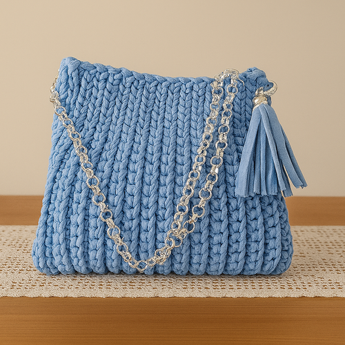 Borsa artigianale in crochet con catena argentata